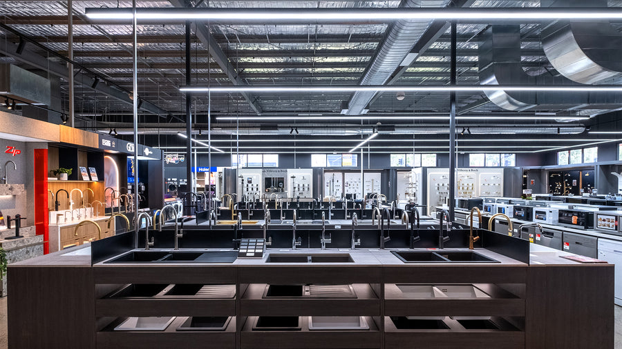 Commercial Dotless LED Strip Pendant Lights by Commercial Suspended in a Commercial Appliances Showroom