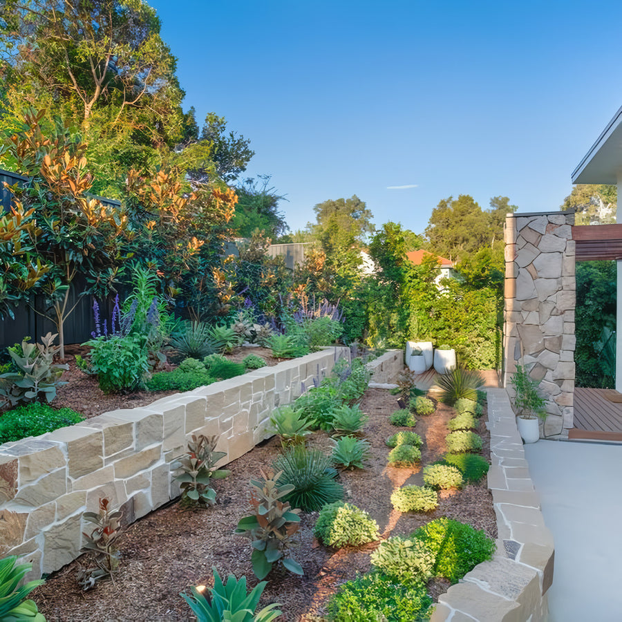 Havit Garden Spike Lights Installed in a Lush Residential Garden Bed