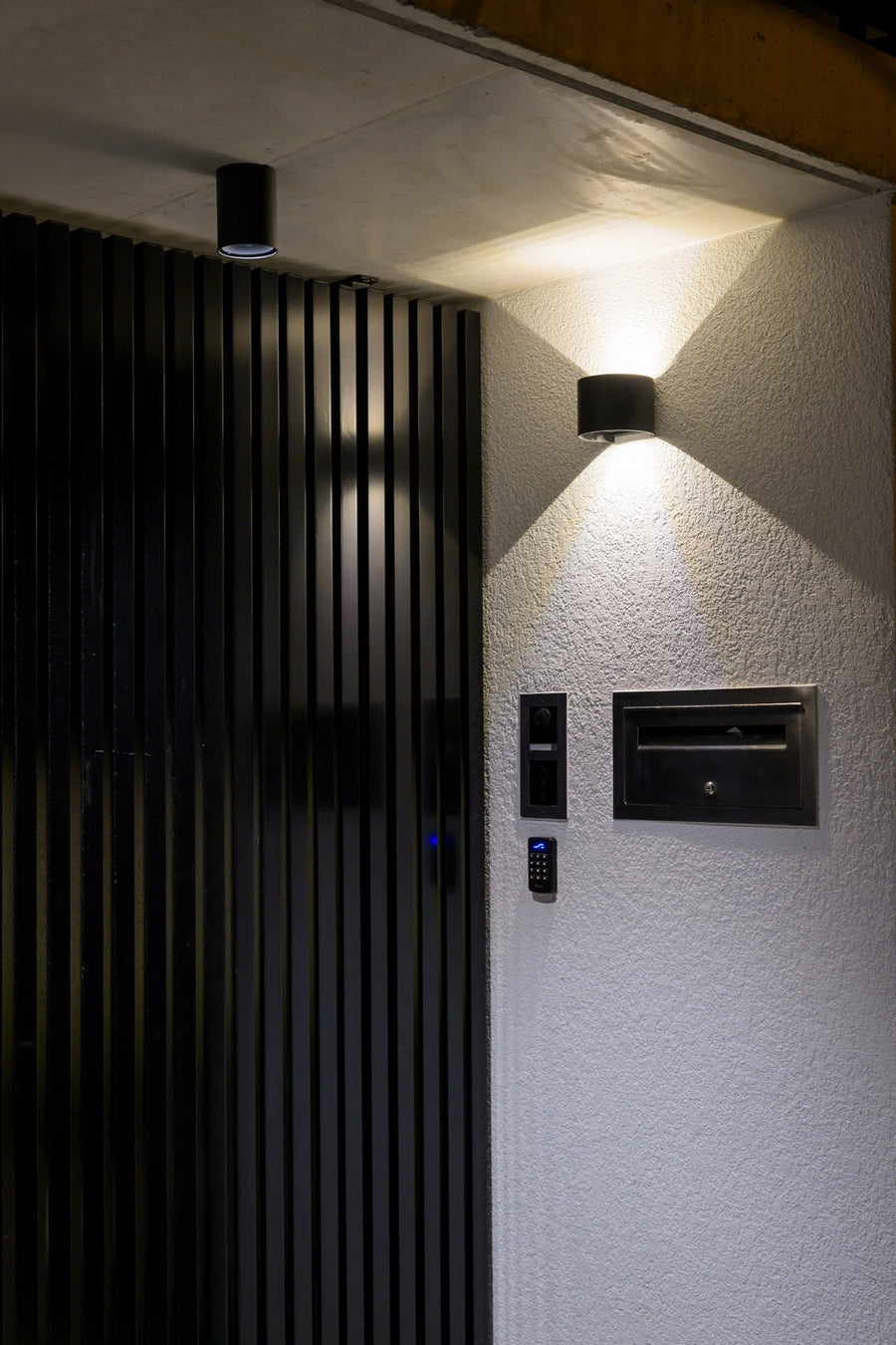 Havit Versa Wall Light and Nella Downlight at a Modern Home Entry Gate