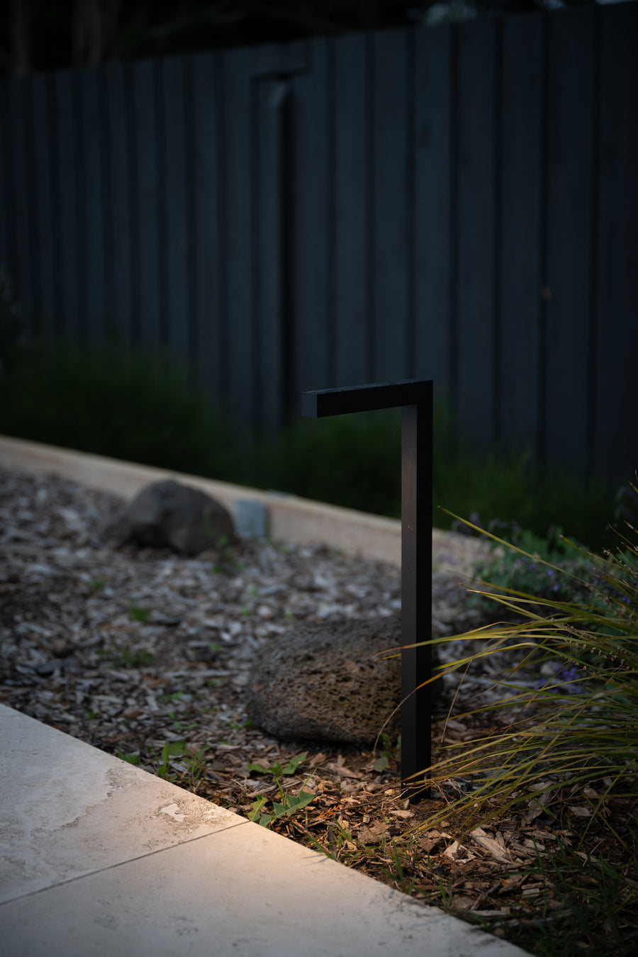 Nedia Black Garden Path Light Beside Garden Pathway