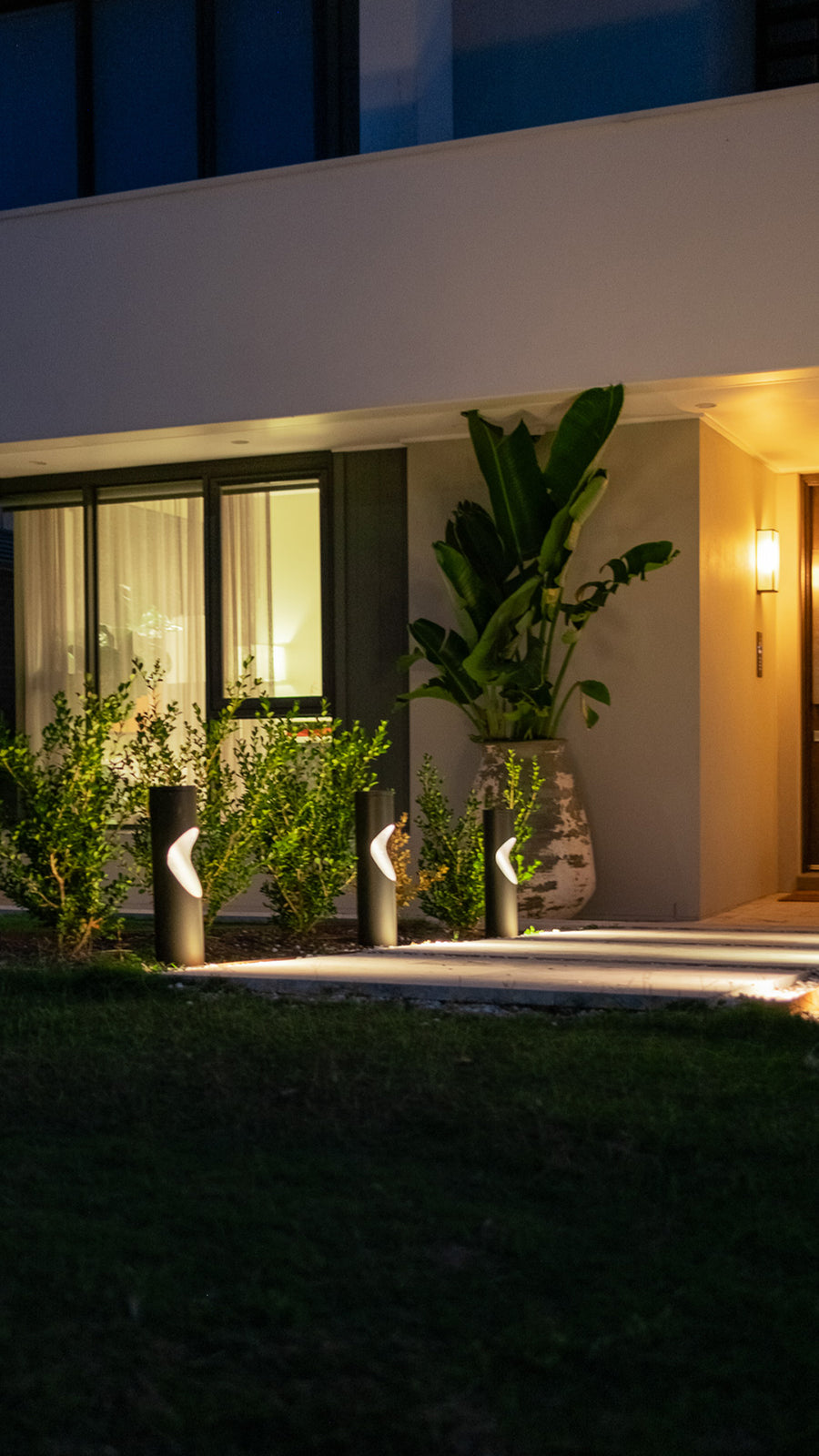 Fedor Black Round Bollard Lights Along Front Entrance Path