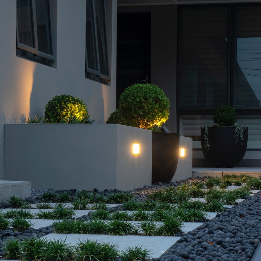 Bata Black Brick Lights on Raised Garden Planter Wall