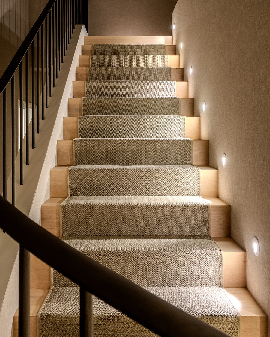 Mini Reces White Step Lights Along Modern Carpeted Staircase