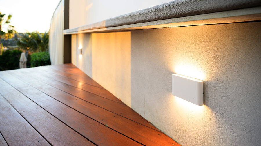 Lisse White Fixed Down Wall Lights Along Outdoor Deck Wall