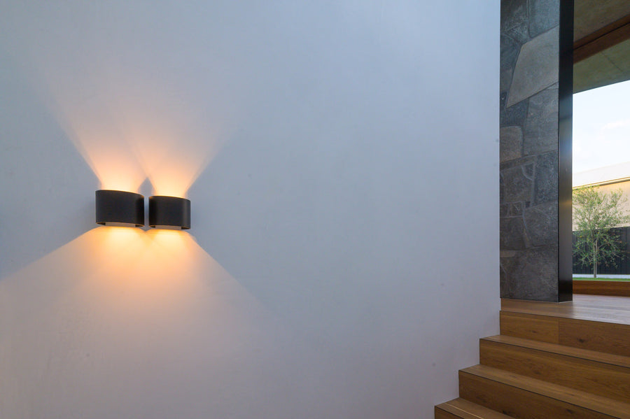 Maro Black Up and Down Wall Lights Beside Timber Interior Stairs