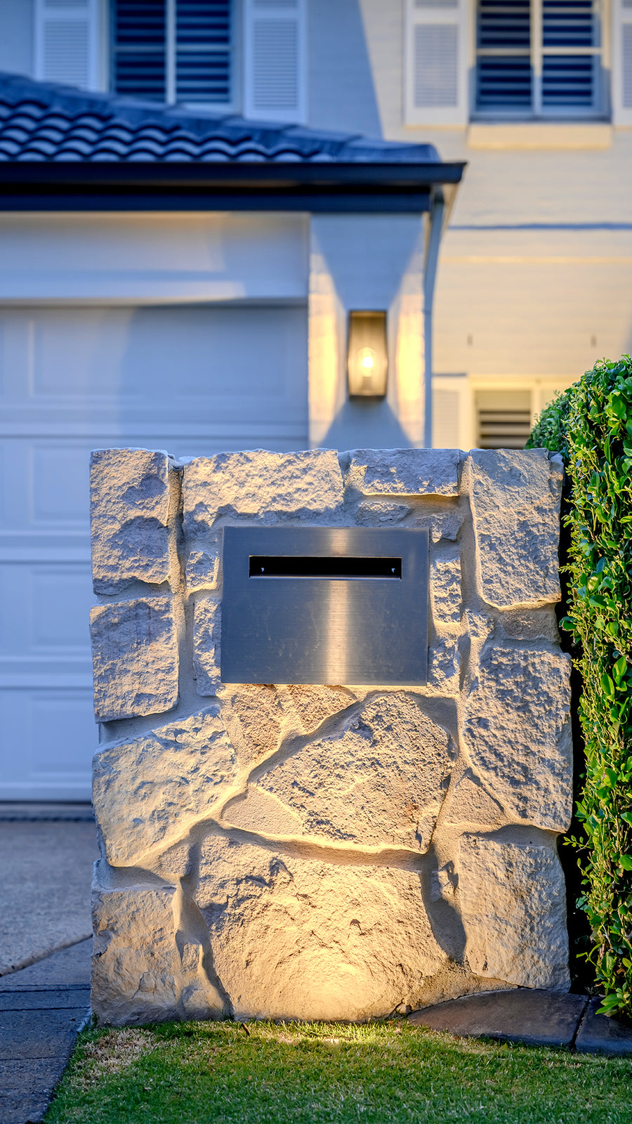 Bayside Black Wall Light and HV2881T-BLK Inground Light on Stone Mailbox Feature