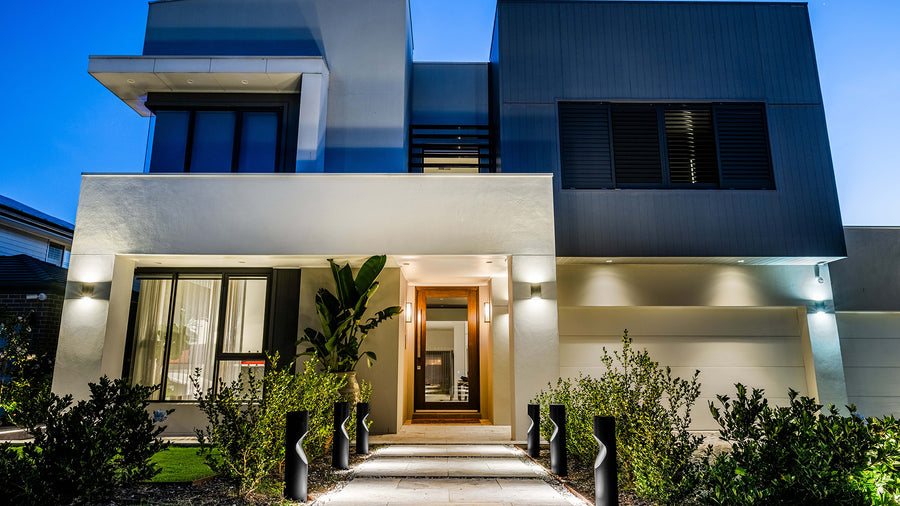 Havit Bollard Lights and Wall Lights Lighting the Front Entry of a Modern Home