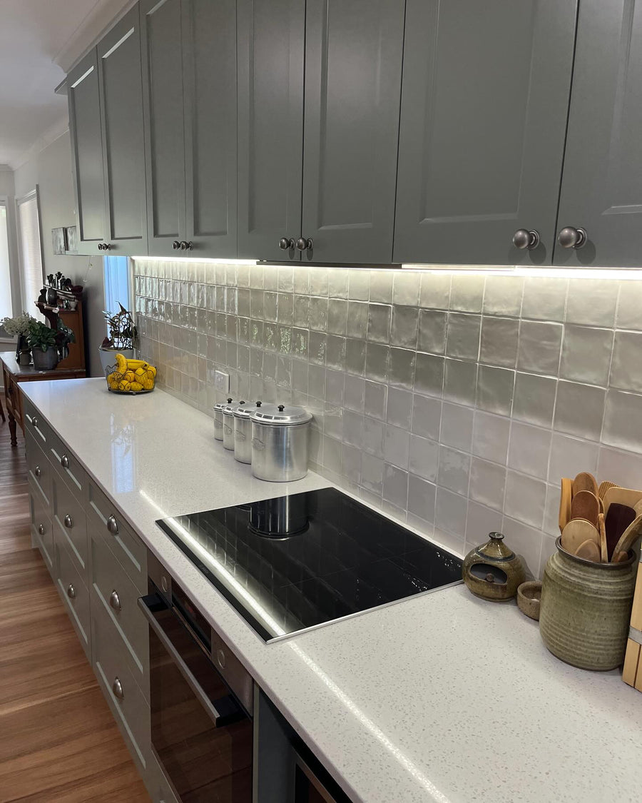 LED Strip Lighting Under Kitchen Cabinets Above Tiled Splashback