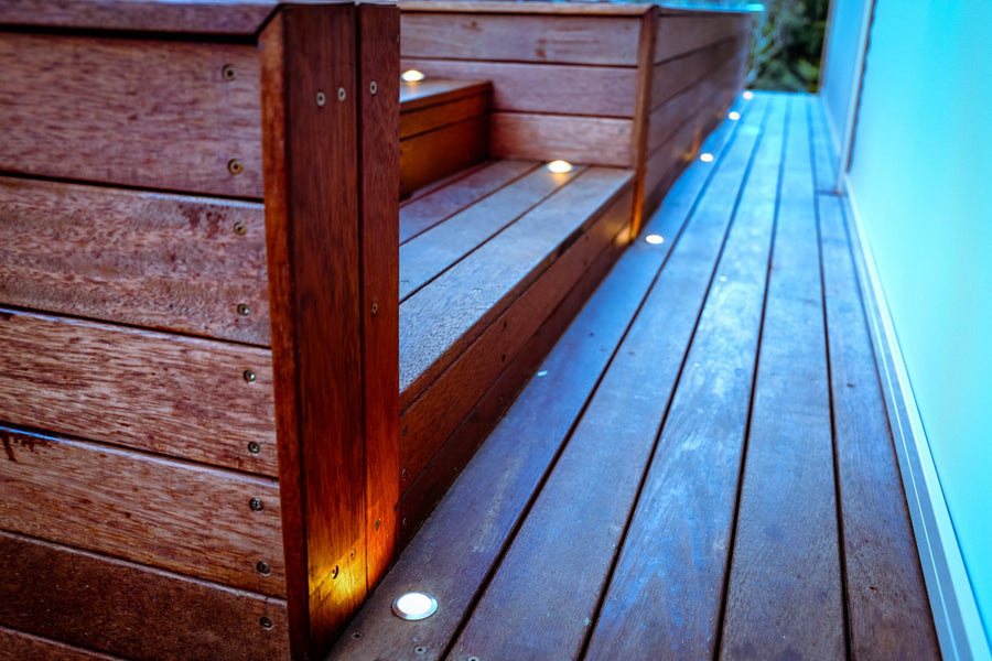 Flame Deck Lights Along Timber Poolside Deck