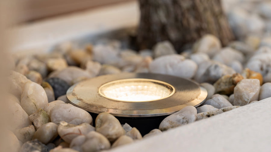 Inground Uplight Among Decorative Garden Pebbles