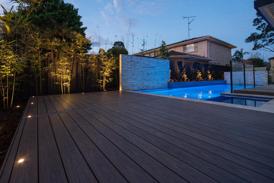 Outdoor Deck Lights Along Poolside Deck and Bamboo Garden