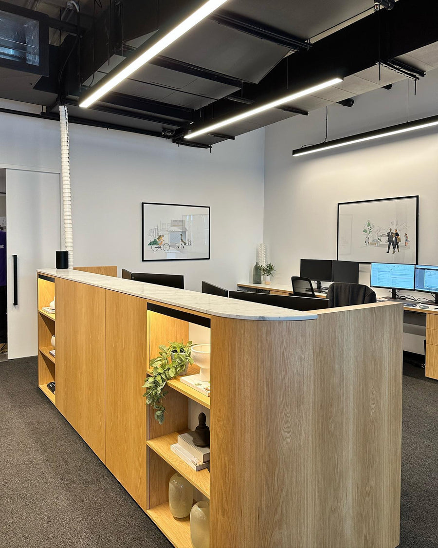 Black Linear Pendant Lights Across Modern Office Fitout