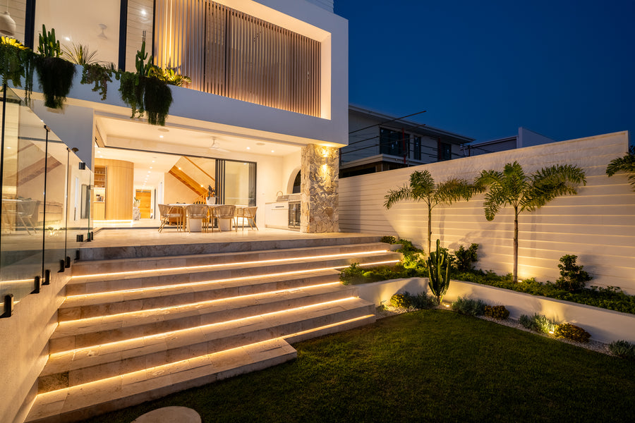 LED Strip Lighting and Up Down Wall Lights Across Modern Backyard