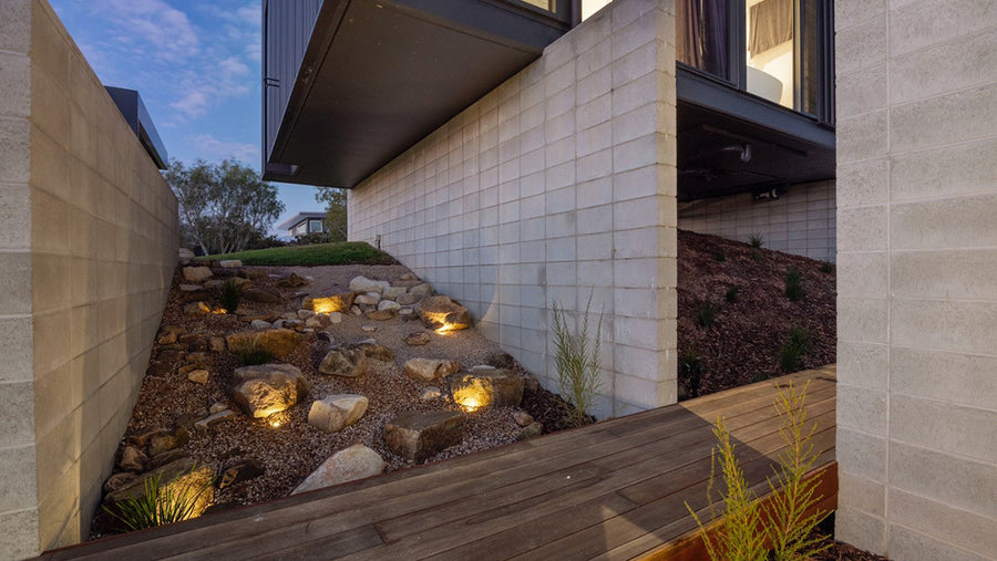 Outdoor Uplights Along Rock Garden and Deck Walkway