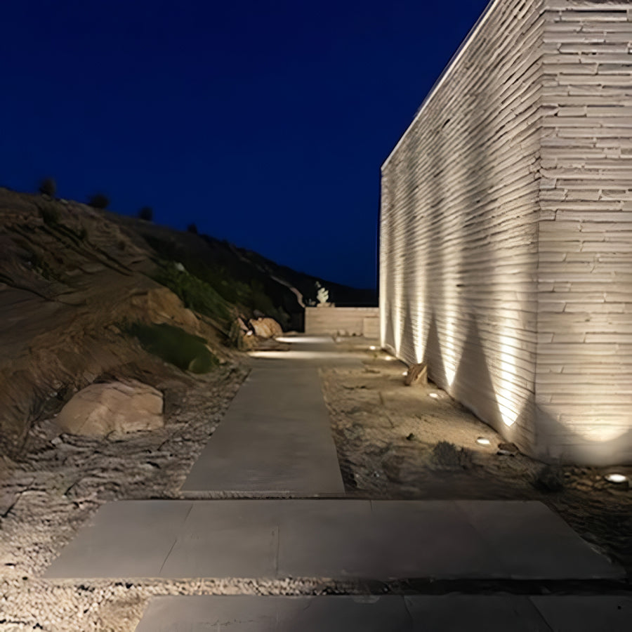 Inground Uplighters Along Outdoor Stone Wall
