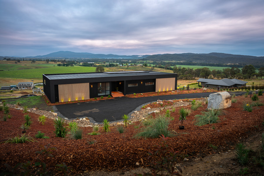 Outdoor Uplights Across Modern Regional Home Exterior